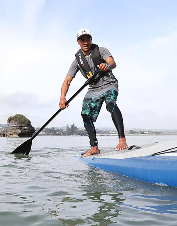 Photo of person on stand-up paddleboard